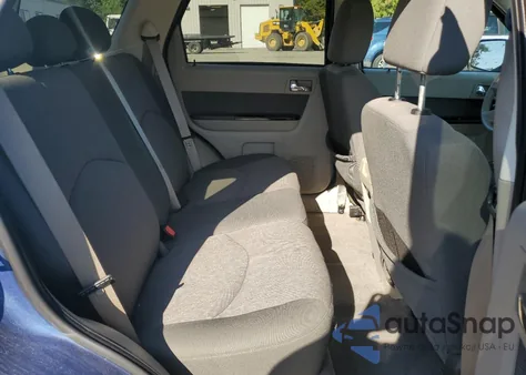 2009 Mazda Tribute I from USA, damaged, VIN 4F2CZ02789KM03061